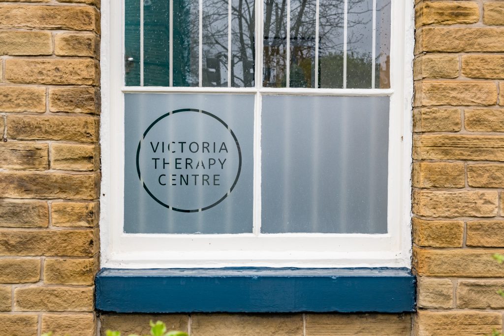 Window logo designs at Victoria Therapy Centre in Saltaire