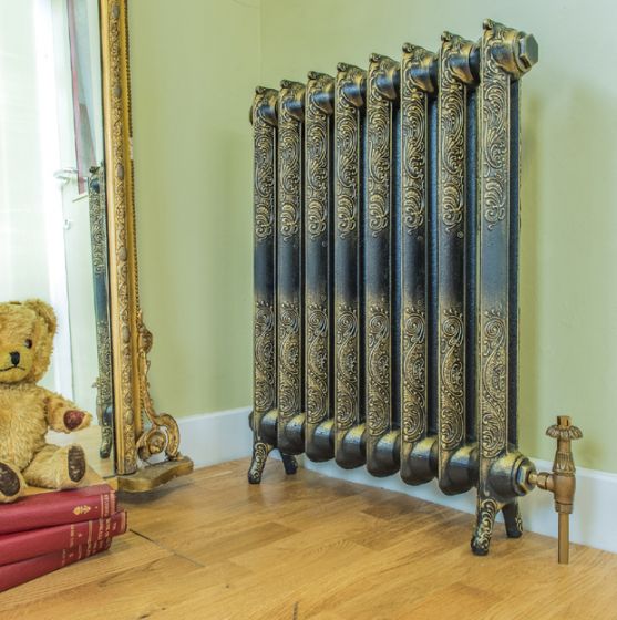 Rococo cast iron radiator in burnished gold